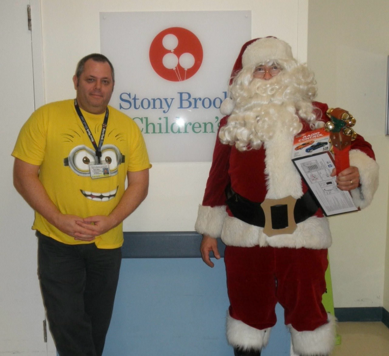 Man with Santa Claus at Stony Brook Children's